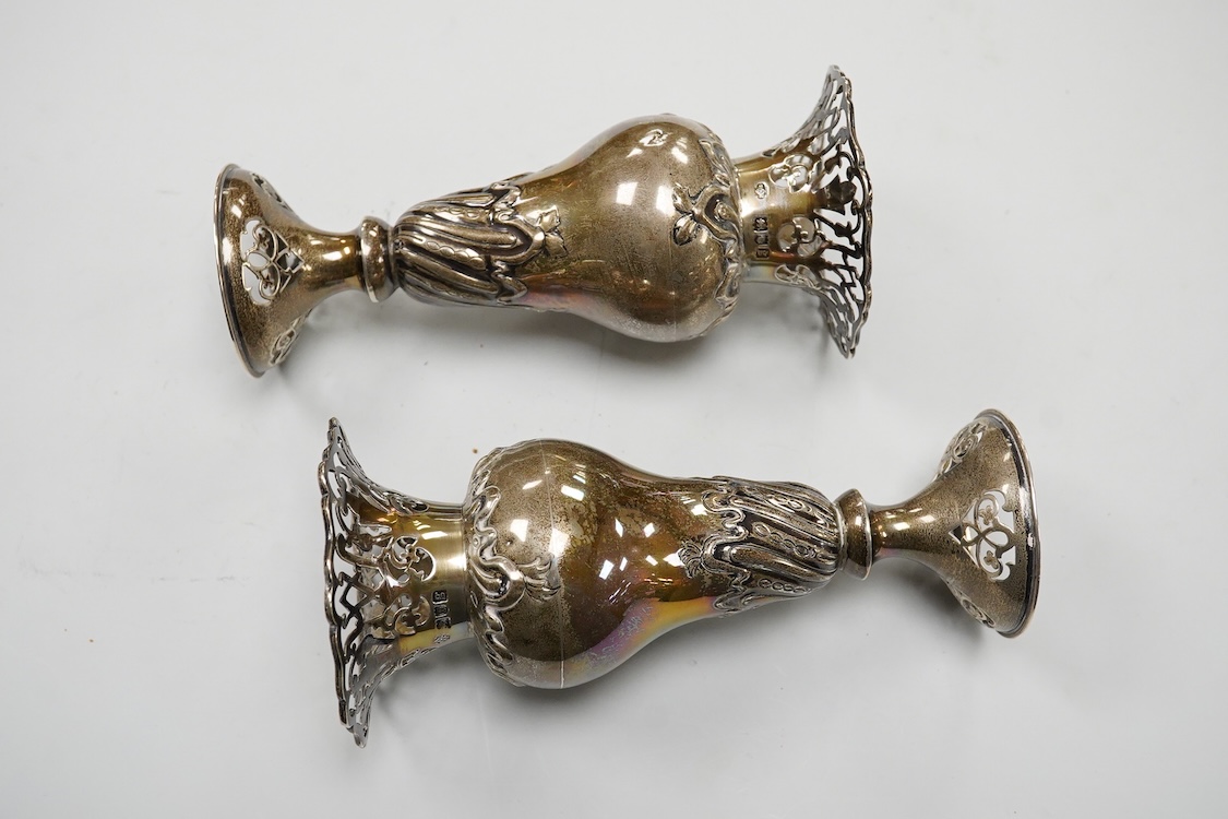A pair of Edwardian pierced silver spill vases, by William Hutton & Sons, Ltd, London, 1902, height 15.7cm, 8.5oz.